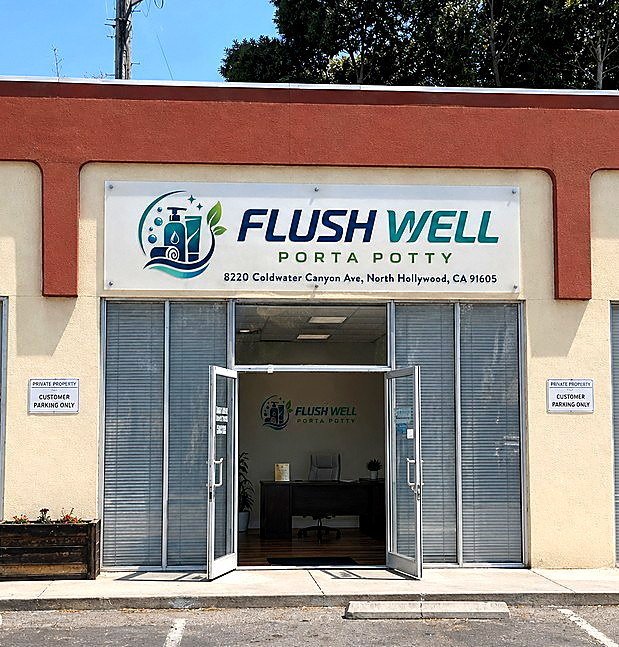 Flush Well Porta Potty storefront with door open